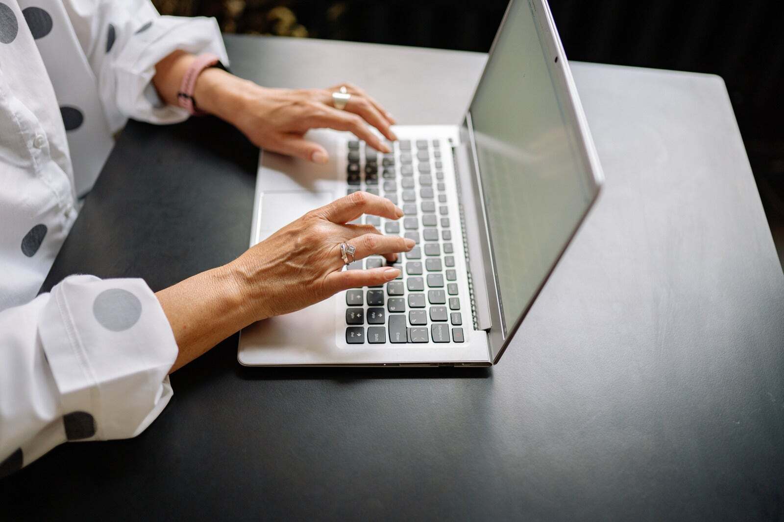 Lawyer completing online CPD courses on a laptop, showcasing flexible legal education for professionals in Australia.